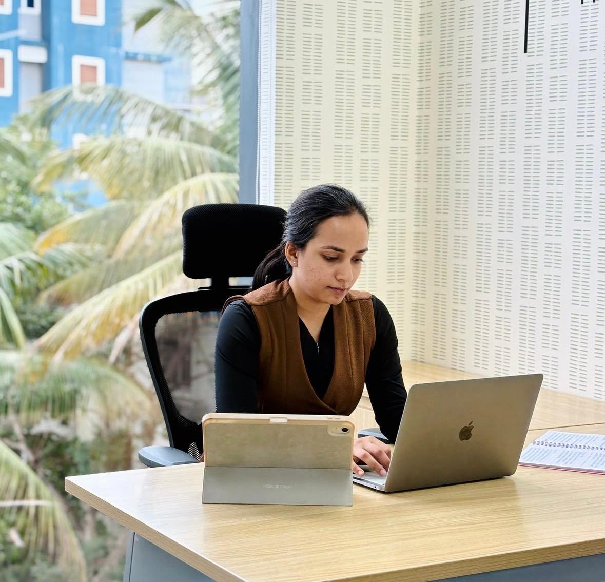 Employee working efficiently at her desk